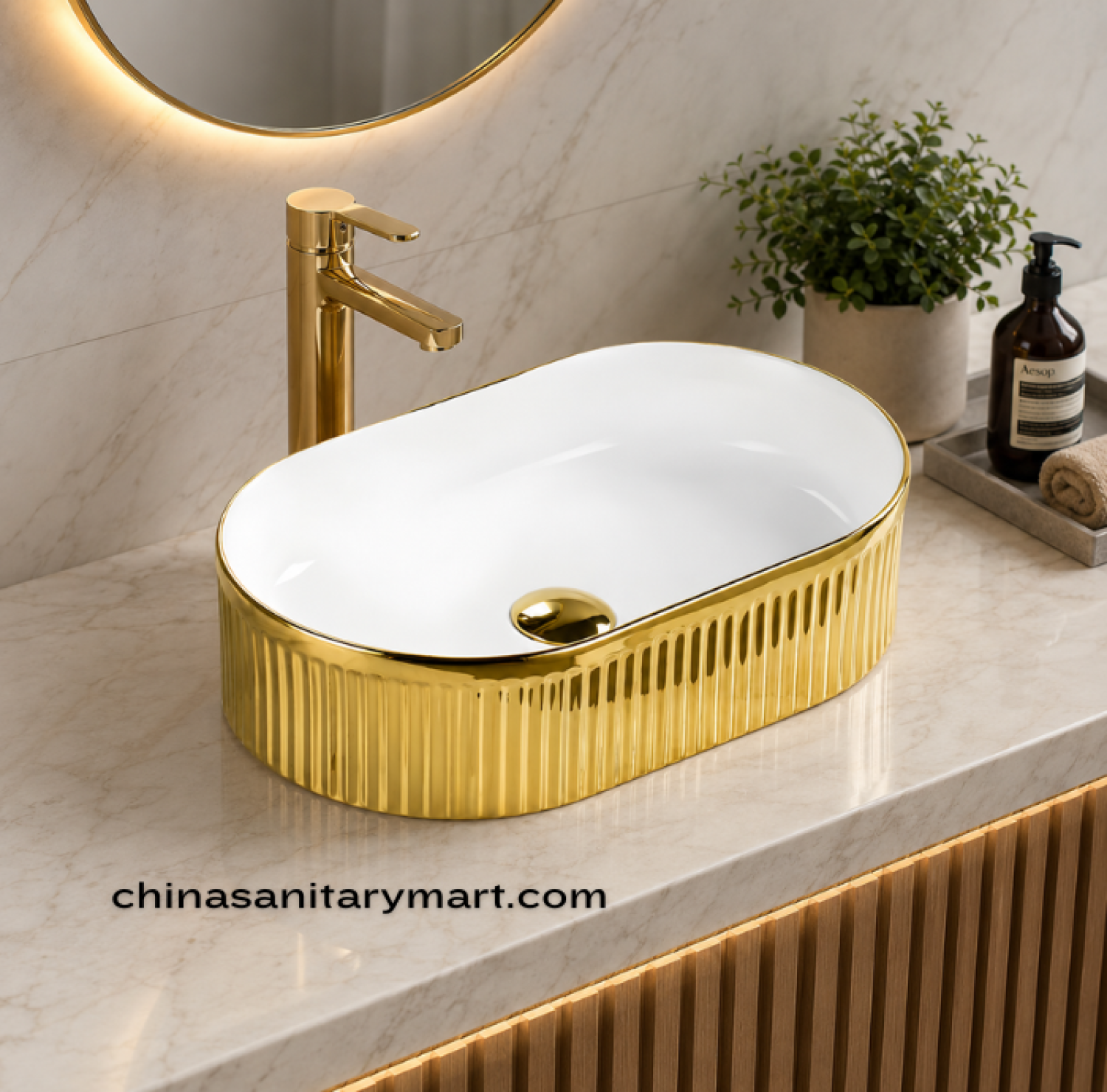 IS-A330S 14×24 Inch luxury countertop wash basin with a glossy white ceramic interior and ribbed metallic gold exterior, oval tabletop design, premium vitreous ceramic construction, ideal for modern luxury bathrooms.